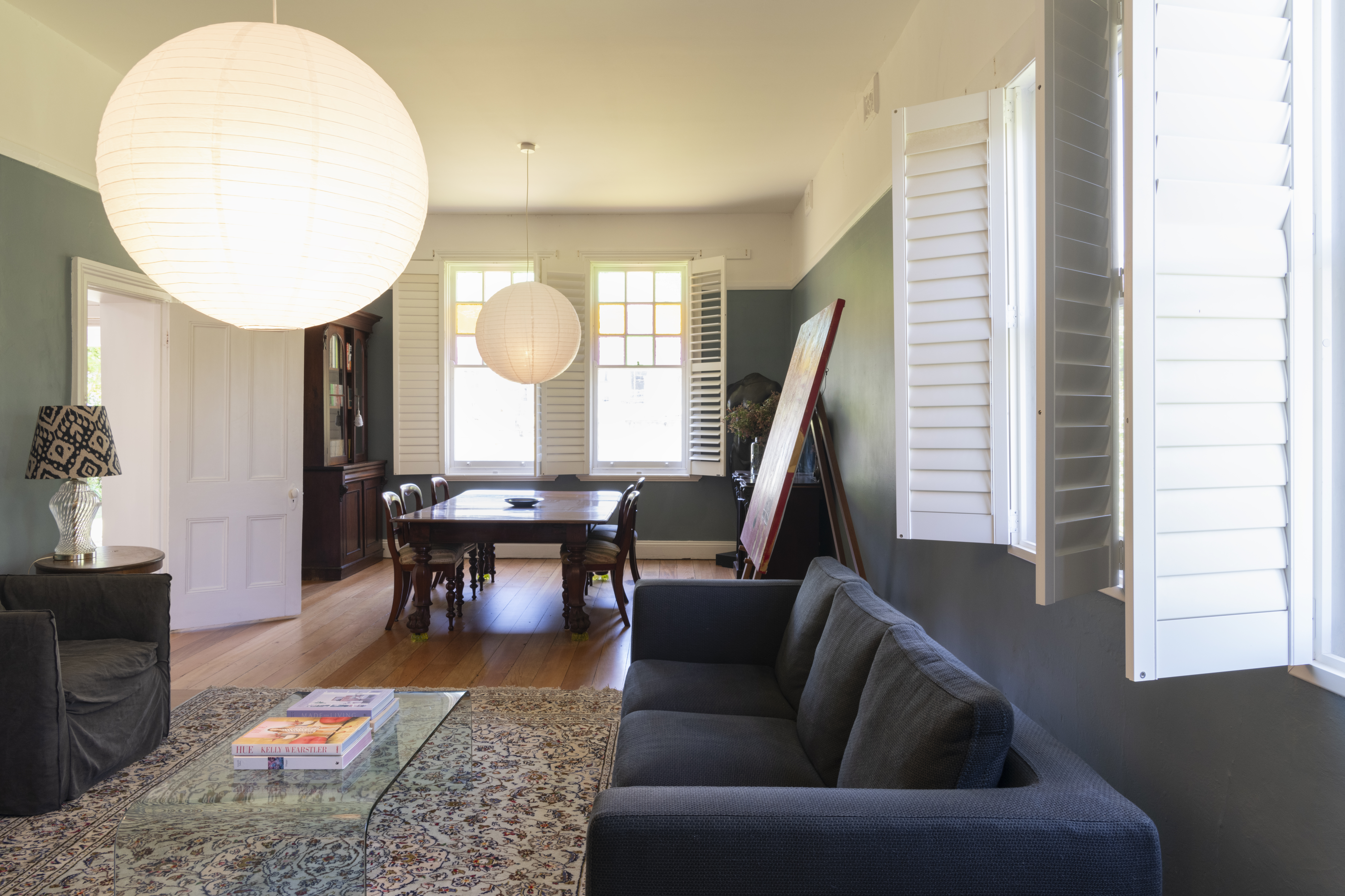 Formal lounge with linen sofas, dining area and Jetmaster fireplace